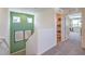 Bright upstairs hallway with an open storage space at 6172 Violet Fls # 42, North Las Vegas, NV 89081