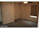 Bedroom features neutral walls, carpet, and a window with blinds at 6528 Chebec St, North Las Vegas, NV 89084