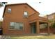 Exterior view of home with covered patio and second story balcony at 6528 Chebec St, North Las Vegas, NV 89084
