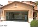 Spacious two-car garage with a water heater and a full-size refrigerator at 6528 Chebec St, North Las Vegas, NV 89084