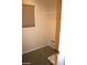 Compact laundry room with tile flooring, window, and laundry hookups at 6528 Chebec St, North Las Vegas, NV 89084
