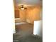 Upstairs living area with carpet, window and ceiling fan at 6528 Chebec St, North Las Vegas, NV 89084