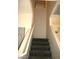 Carpeted stairway with white walls leading to the second level of the home at 6528 Chebec St, North Las Vegas, NV 89084