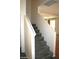 Carpeted stairway with white walls leading to the second level of the home at 6528 Chebec St, North Las Vegas, NV 89084