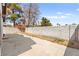 Spacious backyard area with concrete patio and block wall fencing for added privacy at 7008 Brown Derby Circle Dr, Las Vegas, NV 89128