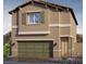 Charming two-story home featuring a two-car garage and neutral color scheme at 7441 Bosco Brook # 104, North Las Vegas, NV 89084