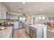 Contemporary kitchen featuring gray cabinets, stainless steel appliances, and quartz countertops at 7441 Bosco Brook # 104, North Las Vegas, NV 89084