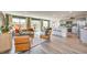 Bright open-concept living space featuring modern decor, kitchen, and lots of windows at 7441 Bosco Brook # 104, North Las Vegas, NV 89084