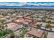 Captivating aerial view of a residence with expansive grounds, showcasing the generous lot size and community feel at 7521 Prancing Pony Ct, Las Vegas, NV 89131