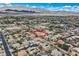 Lovely aerial shot of a spacious home with desert landscaping and an inviting curb appeal in a desirable community at 7521 Prancing Pony Ct, Las Vegas, NV 89131
