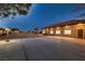 Expansive backyard with a concrete patio, ideal for relaxation and outdoor activities at 7521 Prancing Pony Ct, Las Vegas, NV 89131