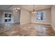 Dining room showcasing tile flooring, recessed lighting, and glass french doors at 7521 Prancing Pony Ct, Las Vegas, NV 89131
