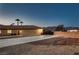 Exterior view showcasing the spacious lot and privacy wall at 7521 Prancing Pony Ct, Las Vegas, NV 89131