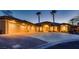 Beautiful front exterior view of the home with ample parking and desert landscaping at 7521 Prancing Pony Ct, Las Vegas, NV 89131