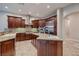 Spacious kitchen boasting granite countertops, stainless steel appliances, and a kitchen island at 7521 Prancing Pony Ct, Las Vegas, NV 89131