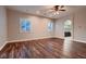 Open living room with hardwood floors and recessed lighting at 7521 Prancing Pony Ct, Las Vegas, NV 89131