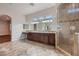 Luxurious bathroom featuring double sinks, vanity, and glass shower at 7521 Prancing Pony Ct, Las Vegas, NV 89131