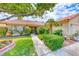 Attractive single story home features well maintained landscaping and quaint front walkway leading to the entry at 7533 Grenfell Dr, Las Vegas, NV 89129