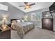 Comfortable bedroom with a neutral color scheme and plenty of natural light at 7860 Villa Del Fuego, Las Vegas, NV 89131