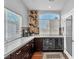 Coffee and wine bar with built-in beverage coolers, counter space, and wine rack at 7860 Villa Del Fuego, Las Vegas, NV 89131
