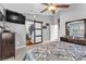 Main bedroom with barn door to bathroom and a spacious layout with ample closet space at 7860 Villa Del Fuego, Las Vegas, NV 89131