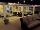 Spacious covered patio with comfortable seating, perfect for entertaining and relaxing outdoors at 7860 Villa Del Fuego, Las Vegas, NV 89131