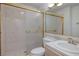 Full bathroom featuring a glass-enclosed shower, toilet, and vanity with sink at 7968 Marbella Cir, Las Vegas, NV 89128
