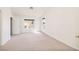 Spacious carpeted bedroom with bright, natural light and a neutral color palette at 7968 Marbella Cir, Las Vegas, NV 89128