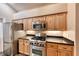 Kitchen features stainless steel appliances and granite countertops at 8348 Mountain Destiny Ave, Las Vegas, NV 89131