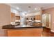 This kitchen features stainless steel appliances, dark countertops, and light wooden cabinets at 8348 Mountain Destiny Ave, Las Vegas, NV 89131