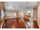 Expansive living area with hardwood floors and an open floor plan at 8348 Mountain Destiny Ave, Las Vegas, NV 89131