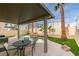 Inviting backyard with a covered patio and lagoon-style pool at 8407 Kettledrum St, Las Vegas, NV 89139
