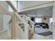 Bright entryway showcasing staircase with glass railings and view into living room at 8407 Kettledrum St, Las Vegas, NV 89139