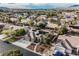 A neighborhood view showcases mature landscaping, desert surroundings, and neat front yards with solar panels at 8412 Starstruck Ave, Las Vegas, NV 89143