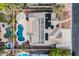 Bird's eye view of a beautiful house with a large pool, patio, and solar panels on the roof at 8412 Starstruck Ave, Las Vegas, NV 89143