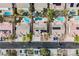Stunning aerial view of neighborhood featuring well-maintained homes, in-ground pools, and lush landscaping at 8412 Starstruck Ave, Las Vegas, NV 89143
