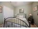 Bedroom features carpet flooring, a queen size bed, neutral paint and window at 8412 Starstruck Ave, Las Vegas, NV 89143