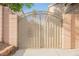 Elegant metal gate with brick pillars, providing security and enhancing curb appeal at 8412 Starstruck Ave, Las Vegas, NV 89143