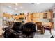 Living room showcasing an open floor plan with a view of the kitchen and dining area at 8412 Starstruck Ave, Las Vegas, NV 89143