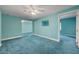 Large bedroom featuring a ceiling fan and easy access to other rooms at 8716 Castle Hill Ave, Las Vegas, NV 89129