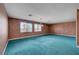Bright living room with natural lighting and cozy carpet at 8716 Castle Hill Ave, Las Vegas, NV 89129