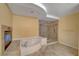 Relaxing main bathroom with soaking tub, and separate shower at 8716 Castle Hill Ave, Las Vegas, NV 89129