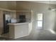 Efficient kitchen featuring ample cabinetry, modern appliances, and a breakfast bar, creating a cozy atmosphere at 900 Heavenly Hills Ct # 219, Las Vegas, NV 89145