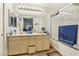 A spacious bathroom featuring a double vanity, and glass-enclosed shower at 9051 Sandy Slate Way, Las Vegas, NV 89123