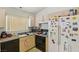 Functional kitchen with ample cabinet space, granite counters, and essential appliances at 9051 Sandy Slate Way, Las Vegas, NV 89123