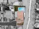 Aerial view showcasing a home with a pool, desert landscaping, and a backyard jacuzzi at 9096 Becket Ranch Ct, Las Vegas, NV 89113