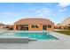 Beautiful backyard pool with gray stone tile, perfect for relaxation and outdoor enjoyment at 9096 Becket Ranch Ct, Las Vegas, NV 89113