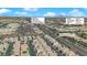 Aerial view of a neighborhood with nearby shopping centers and amenities, offering convenient access to retail and services at 9926 Swimming Hole St, Las Vegas, NV 89183