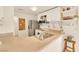 Functional kitchen featuring ample counter space, stainless steel appliances, and open shelving for storage at 9926 Swimming Hole St, Las Vegas, NV 89183