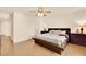 Spacious main bedroom with wood flooring and ample space for relaxation at 9926 Swimming Hole St, Las Vegas, NV 89183